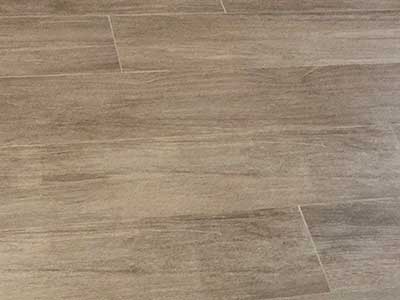 Ceramic floor tiles faux wood installed by TLC Tile Pros Tampa