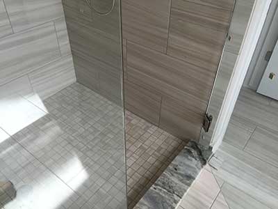 Granite floor tiles installed by TLC Tile Pros Tampa
